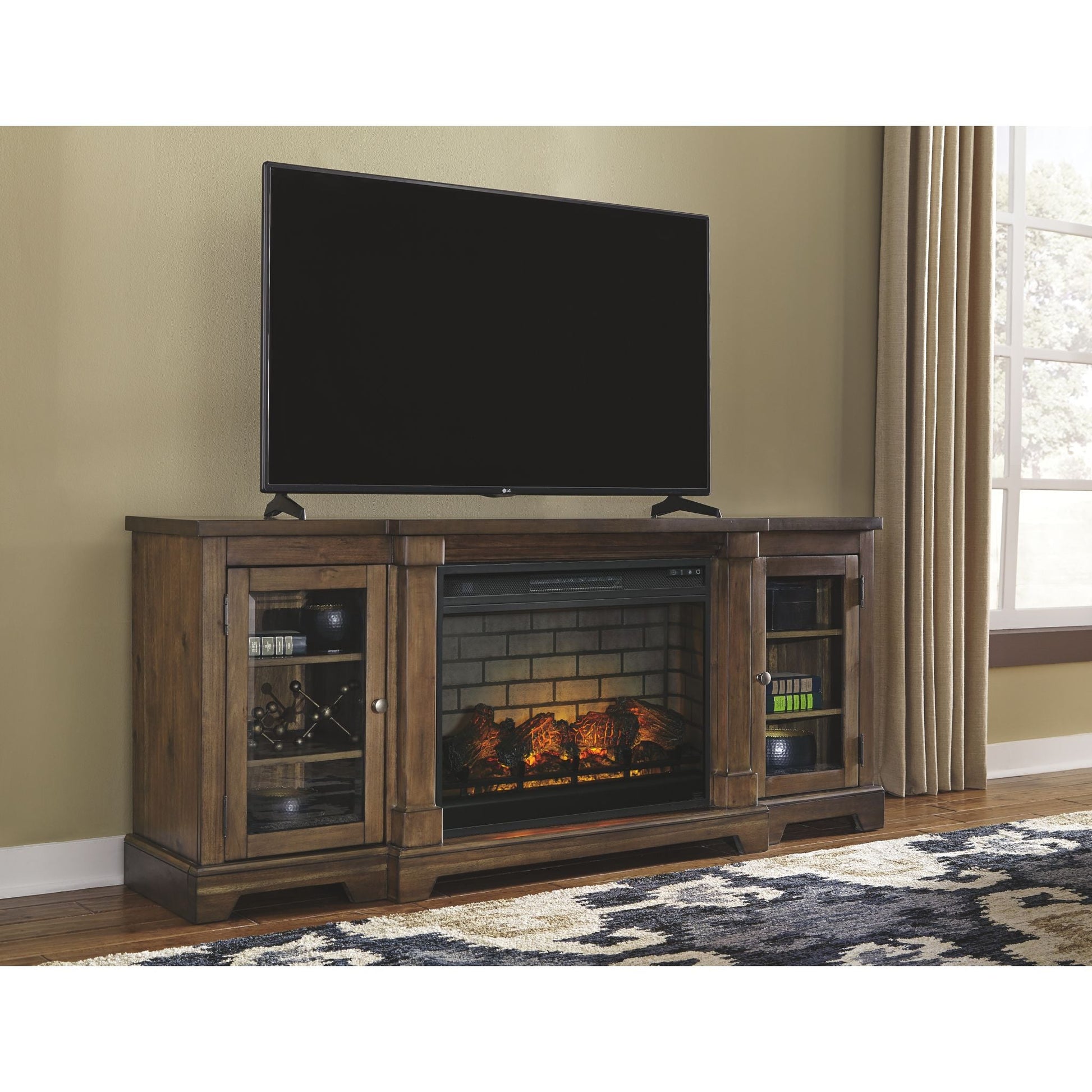 Flynnter TV Stand with Fireplace - Medium Brown